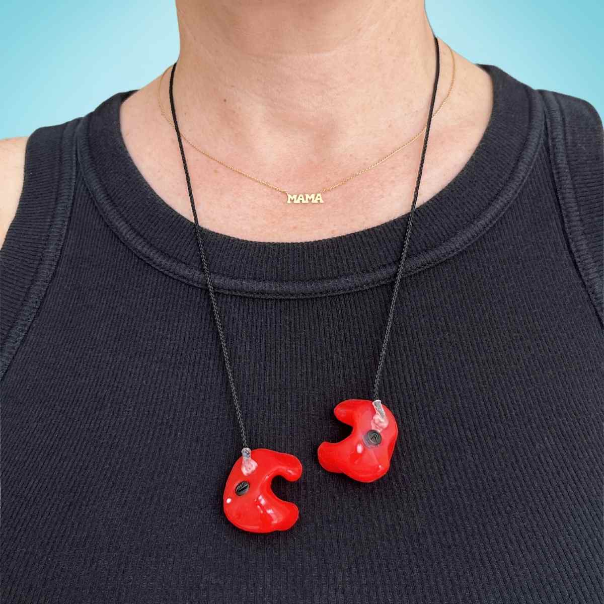 picture of red custom earplugs hanging from a detachable neck cord